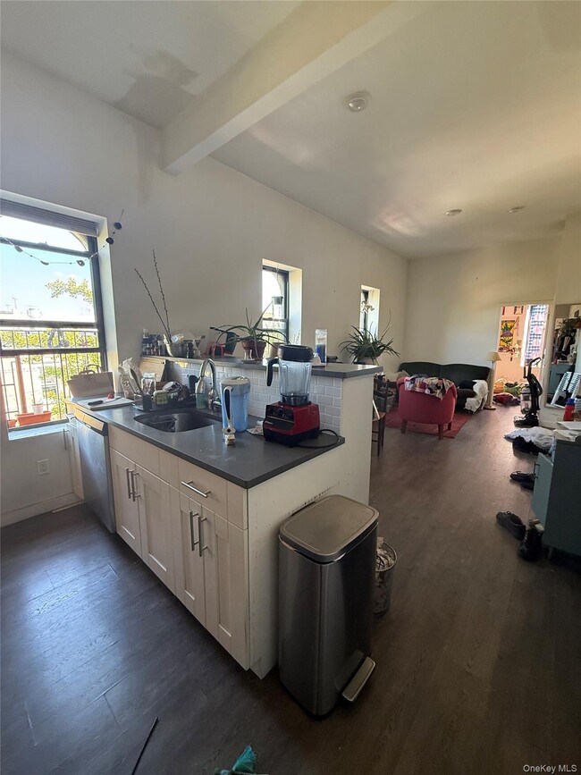 property at 66-17 Myrtle Ave