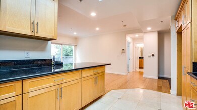 1128 S Serrano Ave-Unit -204 in Los Angeles, CA - Building Photo - Building Photo