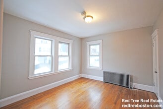 80 Langley Rd, Unit 1 in Boston, MA - Building Photo - Building Photo