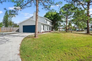 1741 SW Brisbane St in Port St. Lucie, FL - Building Photo