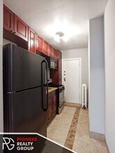 542 W Surf St, Unit 540-N1 in Chicago, IL - Foto de edificio - Building Photo