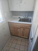 58 W Main St, Unit Studio Apartment in Norwich, NY - Building Photo - Building Photo