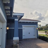 1200 Sterling Pine Pl in Loxahatchee, FL - Building Photo