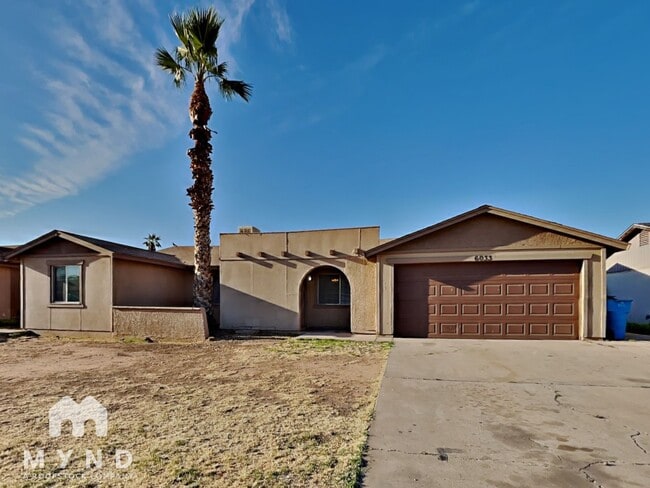 property at 6033 W Vernon Ave