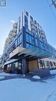7437 Kingston Rd in Toronto, ON - Building Photo