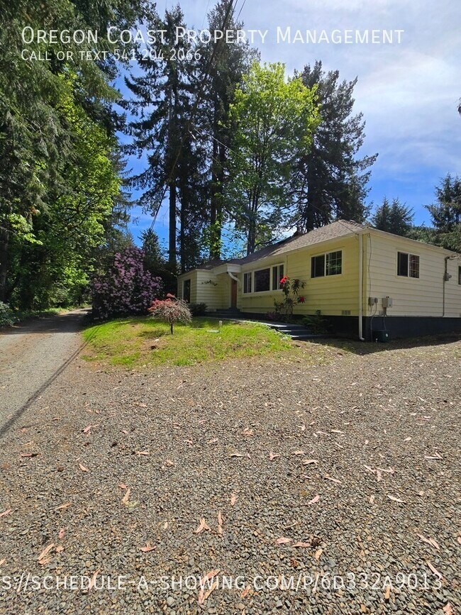 126 N Holiday Ln in Otis, OR - Building Photo - Building Photo