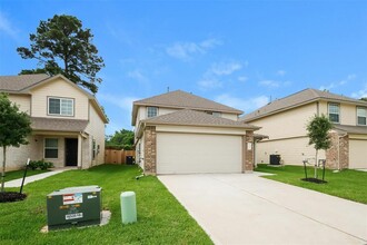 131 Cooper Creek Ln in Willis, TX - Foto de edificio - Building Photo