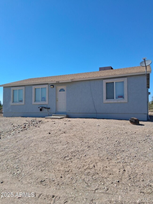 property at 37140 W Desert Bloom St
