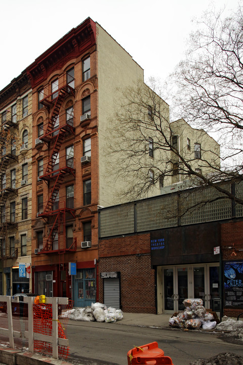 77 E 4th St in New York, NY - Building Photo