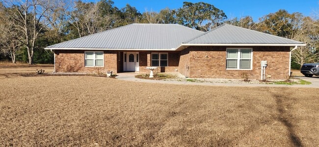 property at 24077 NW 94th Ave