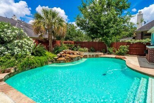 12406 Santiago Cove Ln, Unit K-K127 in Houston, TX - Building Photo