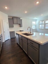 561 Pepperbark Loop in Mustang Ridge, TX - Building Photo - Building Photo