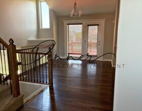 1206 Cooper Dr in Raymore, MO - Building Photo - Building Photo