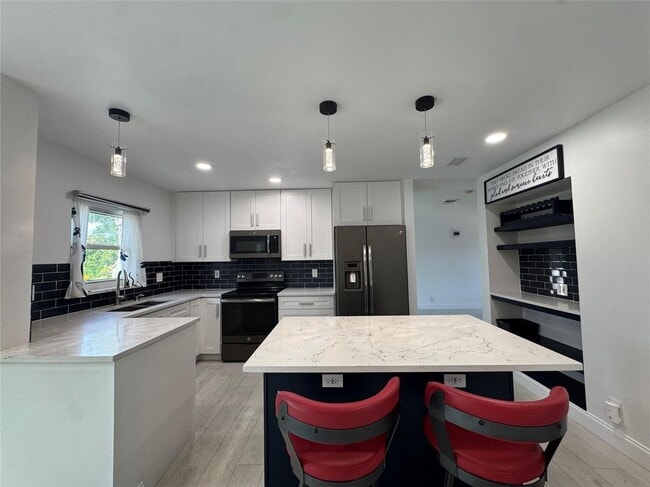 property at 7481 Santa Monica Dr