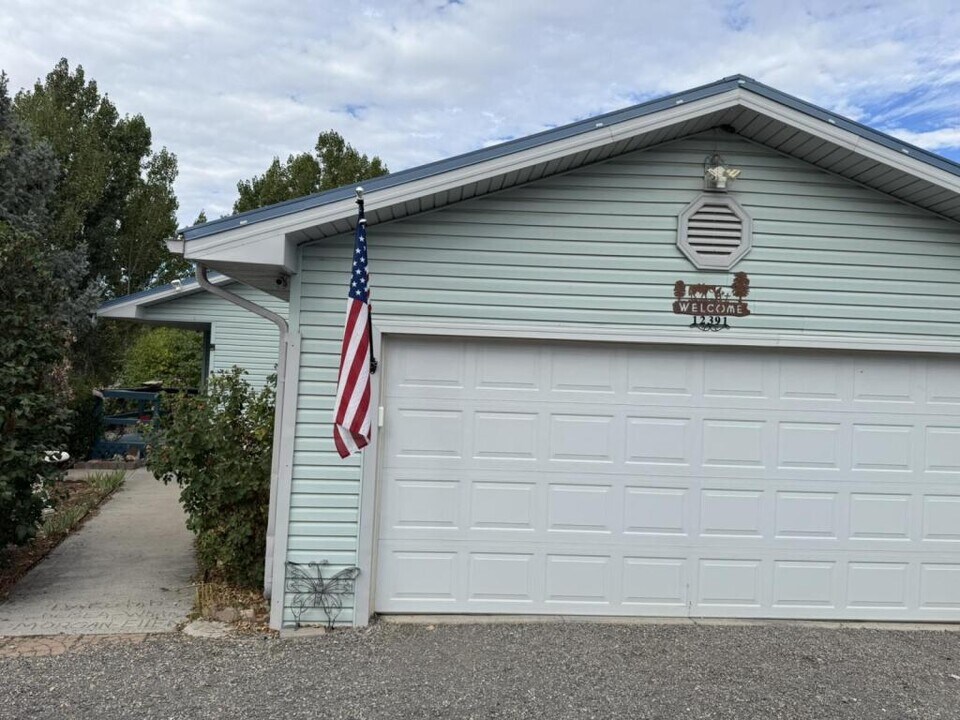 12391 Rockhill Rd in Orchard City, CO - Building Photo