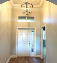 13936 Village Creek Dr in Ft. Myers, FL - Foto de edificio - Building Photo