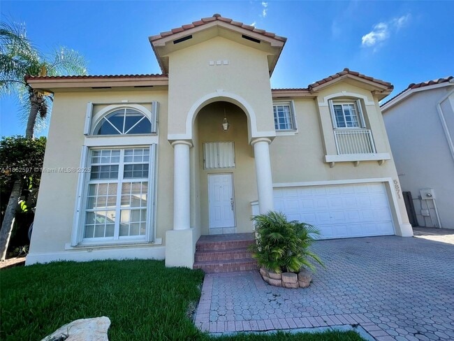 property at 5871 NW 112th Ct