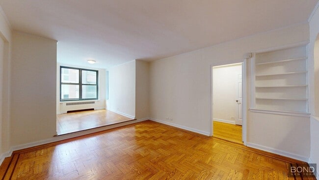 property at 124 E 24th St