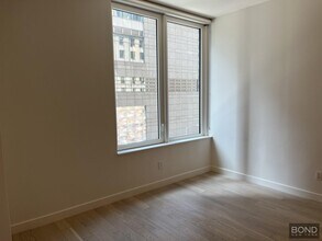 1 W 60th St in New York, NY - Building Photo - Building Photo