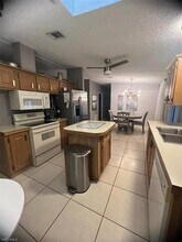 1515 Gulf Coast Dr, Unit 2 in Naples, FL - Building Photo - Building Photo