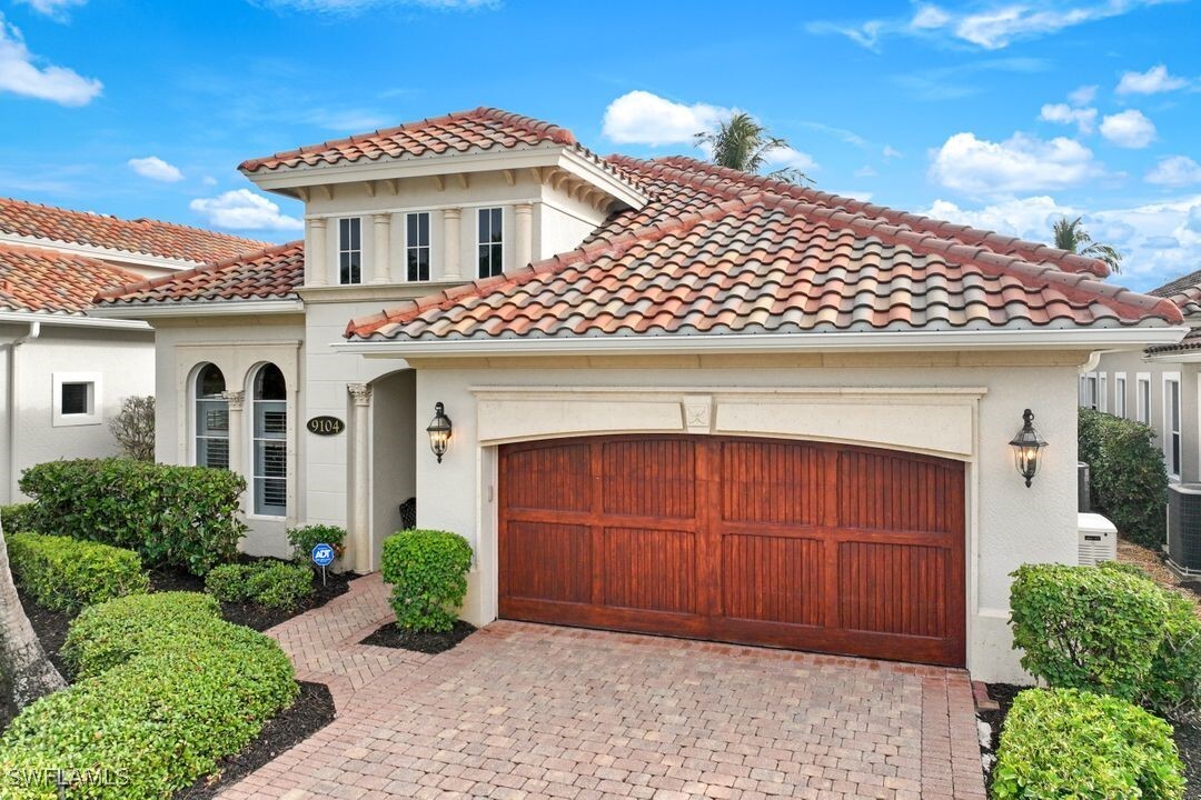 9104 Cherry Oaks Tr in Naples, FL - Building Photo