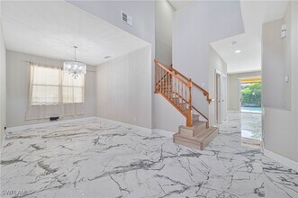 20609 E Golden Elm Dr in Estero, FL - Foto de edificio - Building Photo