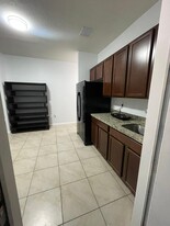 13261 SW 272nd Ln, Unit Efficiency Apartments