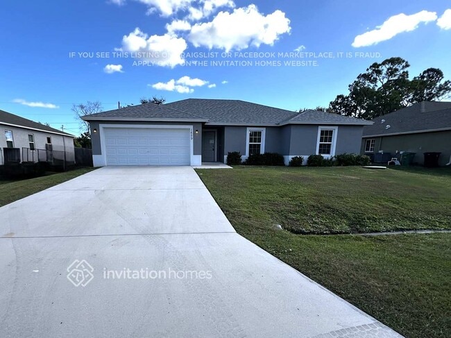 1659 SW Realty St in Port St. Lucie, FL - Foto de edificio - Building Photo