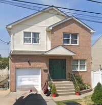 1318 Post Ave in Elmont, NY - Building Photo