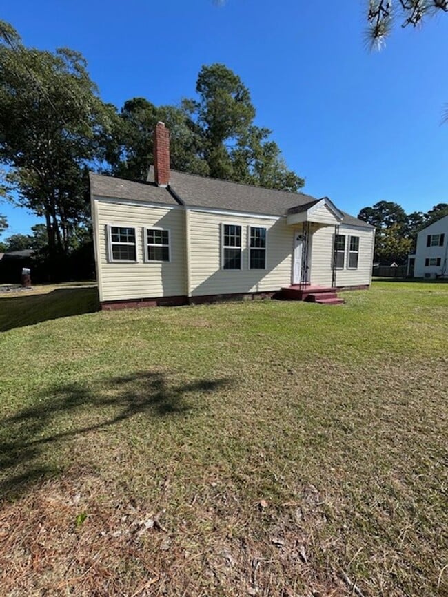 property at 1209 E 6th St