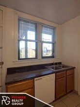 1129 W Oakdale Ave, Unit 1 in Chicago, IL - Foto de edificio - Building Photo