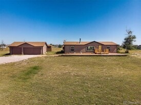 5695 Peerless Farms Rd in Peyton, CO - Building Photo