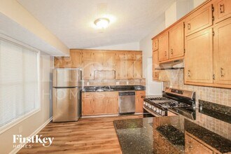 634 Woodsong Ln in Stone Mountain, GA - Foto de edificio - Building Photo