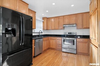 13432 W Alaska Pl in Lakewood, CO - Building Photo - Building Photo