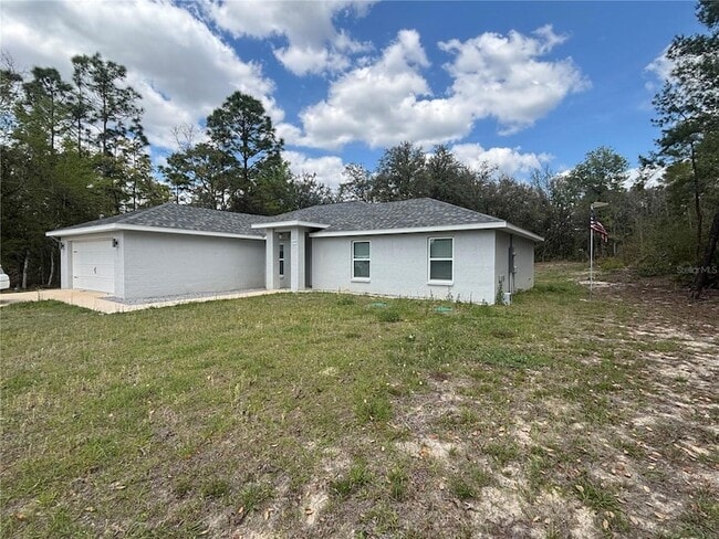 6589 N Bedstrow Blvd, Unit 523 in Citrus Springs, FL - Building Photo - Building Photo