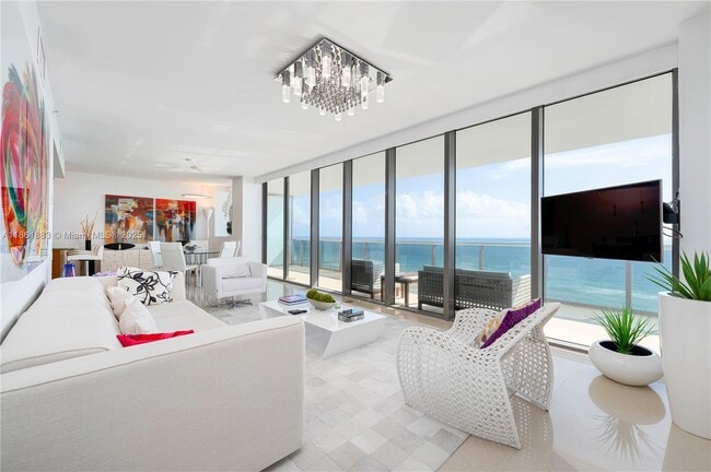 property at 5875 Collins Ave