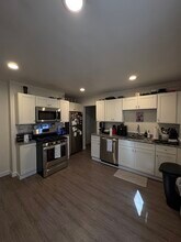 96 Falcon St, Unit 1 in Boston, MA - Foto de edificio - Building Photo