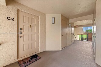 812 Sky Pine Way in Greenacres, FL - Building Photo - Building Photo