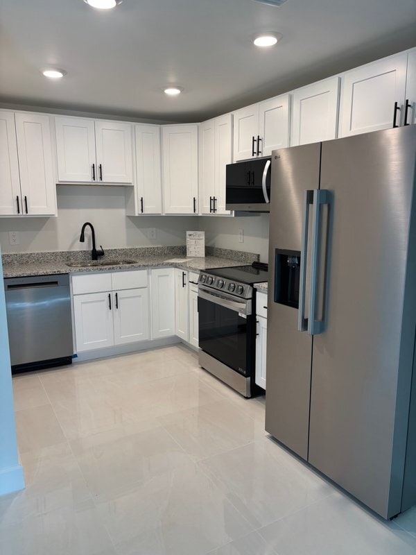 2409-2411 Churchill Ave N, Unit 2411 in Lehigh Acres, FL - Foto de edificio - Building Photo