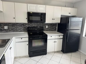 7590 Tahiti Ln in Greenacres, FL - Building Photo - Building Photo