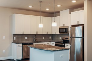 The Village Center Apartments At Wormans M...