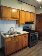 1912 Charles St, Unit 2nd floor in Rockford, IL - Building Photo - Building Photo