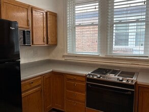 7222 Forsyth Blvd, Unit Unit 1 in St. Louis, MO - Foto de edificio - Building Photo