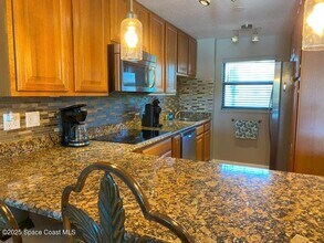 7520 Ridgewood Ave in Cape Canaveral, FL - Building Photo - Building Photo