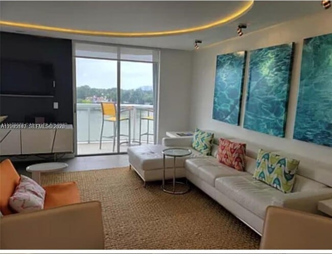 property at 5880 Collins Ave