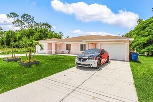 2412 Millie Ave S in Lehigh Acres, FL - Building Photo