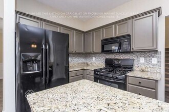 7010 Surrey Dr in Woodstock, GA - Building Photo - Building Photo