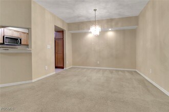 100 Siena Way in Naples, FL - Building Photo - Building Photo
