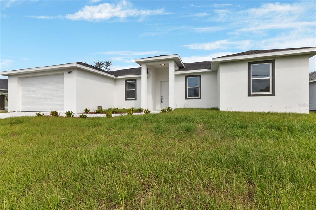 13306 Allentown Ave in Port Charlotte, FL - Building Photo
