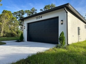 1034 Alcalde St E in Lehigh Acres, FL - Building Photo - Building Photo